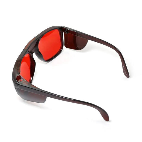 Top Shelf Laser Goggles For 532nm Green Diode Lasers With Heavy Duty Clear Lenses And Slick Carry Case built tough, side view with red lenses.