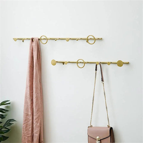 Premium Wrought Iron Coat Hook With Smooth Rounded Edges That Saves Serious Square Footage And Brings Chill Rustic Vibes To Any Front Door Or Mudroom Wall, showcasing a stylish gold hanger.