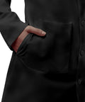 Sturdy Unisex Lab Coat, Classic 39 Inch Length, Pro Grade Medical Gear showing hand in large patch pocket, Black.