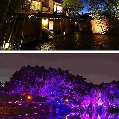 JUDYSSY Led Flood Lights Outdoor Solar Lights illuminating a garden and pathway at night with colorful lights.
