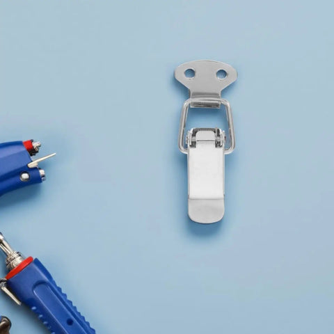 Stainless Steel Spring Loaded Toggle Latch Clasp Buckle Set For Travel Bags And Storage Boxes With Easy Install And Versatile Outdoor Use That Hits The Spot In Silver, shown on a blue background with tools.