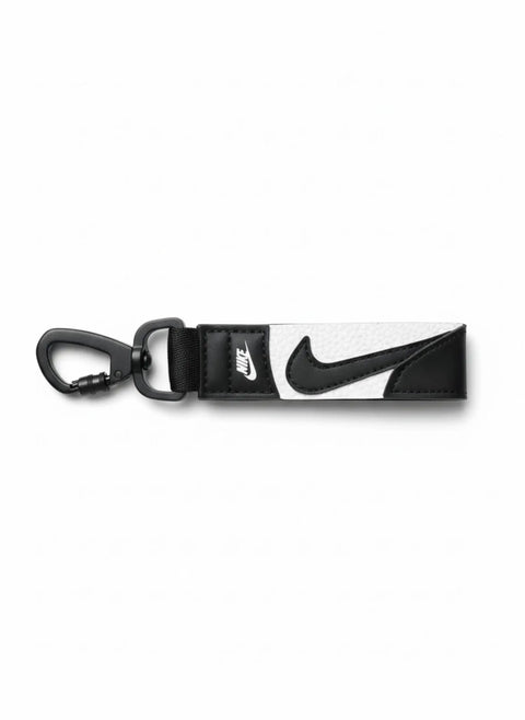 Swoosh Key Holder With Durable Carabiner Clip Keychain For Grab And Go Everyday Carry, featuring black and white Swoosh design.