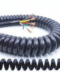 Heavy Duty Coiled Extension Cord That Snaps Back Quick Stretches Twelve Feet For Truck Beds And Workshops Delivers Reliable Three Core Power Without The Tangled Mess Or Annoying Slack On Busy Job Sites.