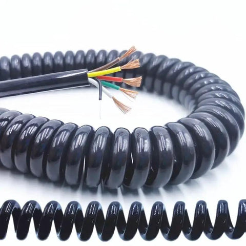 Heavy Duty Coiled Extension Cord That Snaps Back Quick Stretches Twelve Feet For Truck Beds And Workshops Delivers Reliable Three Core Power Without The Tangled Mess Or Annoying Slack On Busy Job Sites.