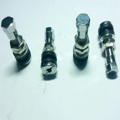 Motorcycle tire valve stems; 4 silver stainless-steel tubeless stems with rubber seals and hex heads (front view).