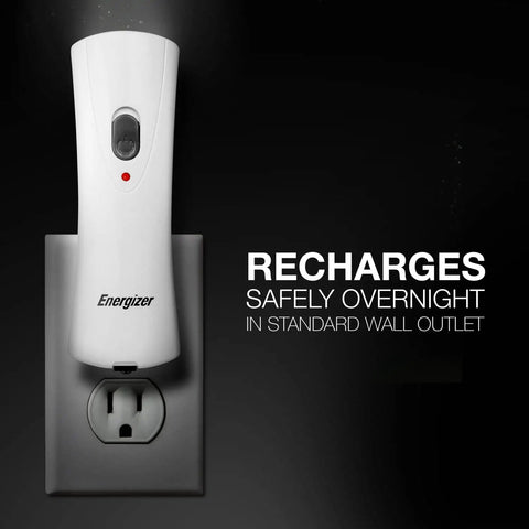 Auto On LED Flashlights Rechargeable For Home Power Outages plugged into wall outlet for charging.