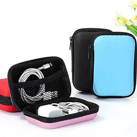Compact Purple Charger Organizer Storage Case Durable Hard Shell Keeps Charging Cords Earbuds And Phone Gear Slick And Secure Easy Go Anywhere Stash For Daily Tech Setup Use with contents visible.