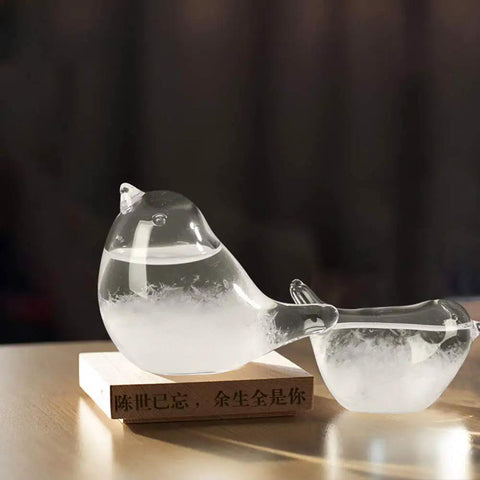 Bird-shaped storm glass weather forecaster on wooden base, high borosilicate, for home and office decor, weather gauge.