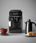 Crisp Roast Fully Automatic Espresso Maker With Killer LatteGo Milk Frothing, sleek black design next to coffee cup and toast.
