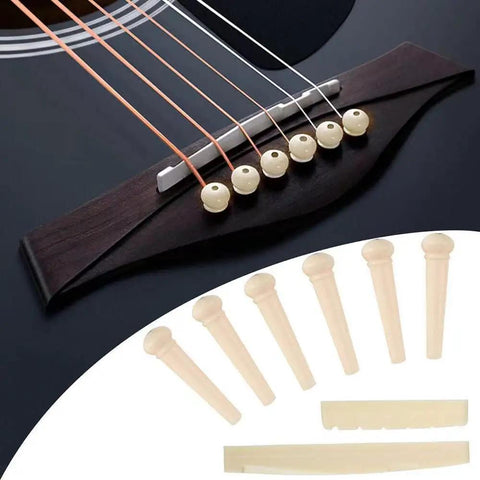 Bridge and pins from Guitar Maintenance Kit 77 Piece Set With Carry Bag For Acoustic Electric Ukulele Bass Banjo And Other String Instruments Includes Nut Saddle Files Radius Gauges Allen Wrenches Bridge Pins Winder Pliers Feeler Gauge And More For Quick Pro Setups.