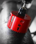 Diablo carbide teeth hole saw, red, close-up view, 2-3/4 in diameter for wood and metal.