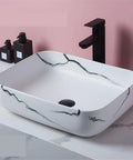 USZWBY Vanity Sink Imitation Marble Pattern Vessel Above Counter Basin Art Ceramic Bathroom Sink with elegant black faucet.