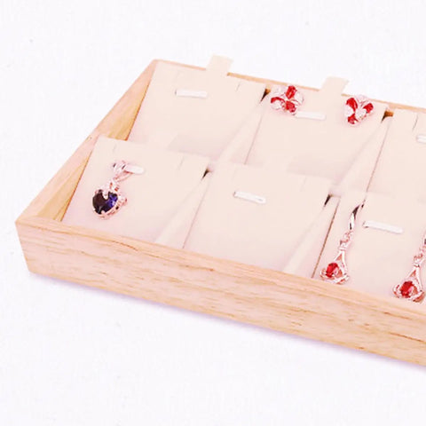 Retro Wooden Jewelry Organizer Tray With Eight Grids To Keep Your Bling Slick And Prevent Tangles While Displaying Necklaces And Earrings On Any Desk Surface with earrings and pendant.
