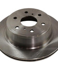 Front view of automotive brake rotor with central hub and bolt holes, metallic silver