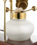 Premium Manual Coffee Brewer With Heat Proof Borosilicate Glass And Food Safe Stainless Steel Pour Over Set for Home Office smooth sipper gold edition. Close-up of glass container with gold lid.