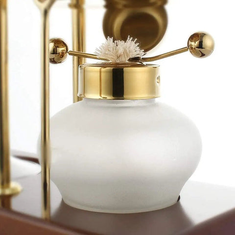 Premium Manual Coffee Brewer With Heat Proof Borosilicate Glass And Food Safe Stainless Steel Pour Over Set for Home Office smooth sipper gold edition. Close-up of glass container with gold lid.