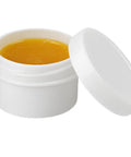 Open jar of flux paste from Soldering Kit With Rosin Core Solder Wire And Flux Paste 50g Tin Lead Solder Set For Electrical And Electronic Repair 0.75mm 50g Plus Flux Paste For Quick Fixes And DIY Projects.