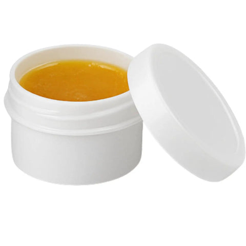 Open jar of flux paste from Soldering Kit With Rosin Core Solder Wire And Flux Paste 50g Tin Lead Solder Set For Electrical And Electronic Repair 0.75mm 50g Plus Flux Paste For Quick Fixes And DIY Projects.