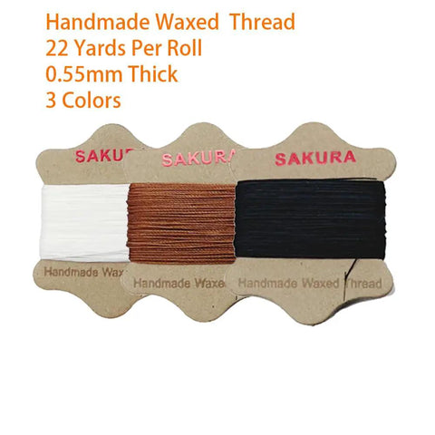 Three spools of 0.55mm waxed thread in black, white, and brown colors, part of the Upholstery Repair Kit With 0.55mm Waxed Thread And Heavy Duty Needles For Leather Canvas And Quilting Includes Three Colors Black White Brown And Seven Tools For DIY Quick Easy Repairs At Home Or On The Go.