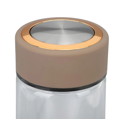 Top view of the portable hydrogen water bottle featuring stainless steel lid and sleek glass body for gym and office use.