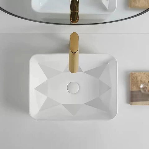 USZWBY Bathroom Vessel Sink Bathroom Vessel Sink, Geometry Artistic White Ceramic Sink Bowl, Rectangular countertop view with gold faucet.