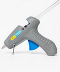 Heavy Duty Full Size Hot Glue Gun Kit With Pack Of Eight Eight Inch Multi Temp Glue Sticks For Woodworking Home Repair side view of gray glue gun