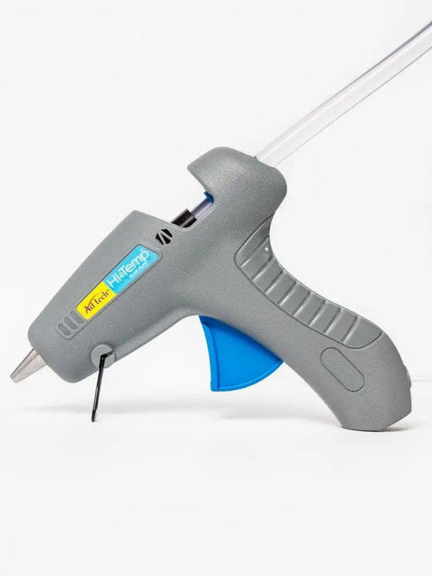 Heavy Duty Full Size Hot Glue Gun Kit With Pack Of Eight Eight Inch Multi Temp Glue Sticks For Woodworking Home Repair side view of gray glue gun