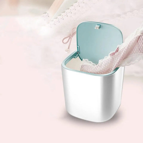 Knock Out Your Laundry Hustle With Slick Portable Mini Washing Machine Featuring Blue Drum Spin Freshens underwear and delicates in white wash tub.