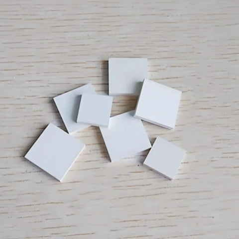 High Purity BN Ceramic Sheet For Heat Sinks And Lab Research, 10mm By 100mm By 100mm, 1 Piece, ceramic squares on table