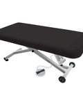 EarthLite Ellora Electric Lift Massage Table With Flat Top And Black Finish, featuring robust steel frame and foot pedal for height adjustment.