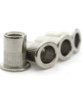 Grab A 6 Pack Of Flat Head Threaded Inserts For M3 M12 Heavy Duty Rivnuts Perfect For Sheet Metal Steel Aluminum And Auto Projects Rust Resistant Fixings showing four stainless steel rivnuts.