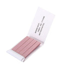 Open pack of 4 pink litmus strips, part of 4 Pack pH Test Strips With 320 Indicator Papers For Water Food Soil Testing, Easy Home Lab Kit.