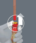 Close-up of Kraftform Compact VDE 17 Extra Slim 16 Piece Insulated Set screwdriver, red handle with insertion feature.