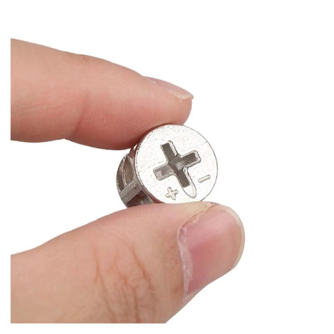 Hand holding Three In One Thickening Connector Eccentric Wheel For Furniture Hardware, 15mm diameter, zinc alloy, nickel plated