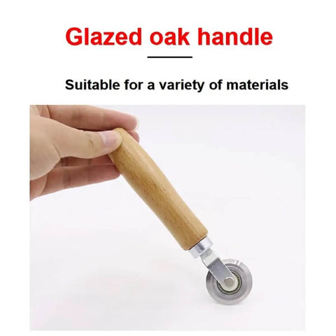Hand holding Pro Grade Box Resizer Tool with glazed oak handle and high precision bearing roller for smooth scoring and resizing.