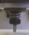 HQMaster 1/8 in upcut single-flute router bit, installed in CNC spindle
