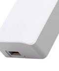 Rock Solid Uninterruptible Power Supply With 2600Mah Battery Backup showing a light gray adapter with a smooth finish.