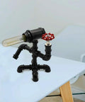 Decorative lamp made from Malleable Iron Pipe Coupling 1/2 Inch Black For Industrial DIY Shelving And Furniture, with vintage bulb