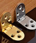 180 Degree Folding Table Hinge For Cabinets And Furniture Hardware, Heavy Duty Zinc Alloy shown in gold and silver colors on wood surface