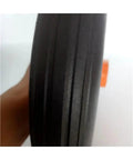 Built Tough 14 Inch Hella Durable Solid Rubber Caster Wheel For Heavy Duty Industrial Trolley and Mining Cart Replacement Knockout close-up of rubber wheel's side texture.