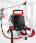Heavy Duty 950W Airless Electric Paint Sprayer With Adjustable Stand And 10M High Pressure Hose in action with accessory nozzle.