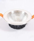 DJVHSRI Recessed Lighting Housing Trim Kits Recessed Spot Lamp with reflective surface and orange clips for easy installation.