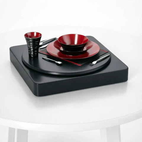 360 Degree Motorized Rotating Display Stand For Photography Products showcasing red and black dishware set on a smooth spinning platform.