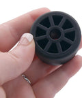 Hand holding black Refrigerator Rear Caster Wheel Replacement For DA61-04703A 2033808, 1.5-inch diameter by 1-inch wide