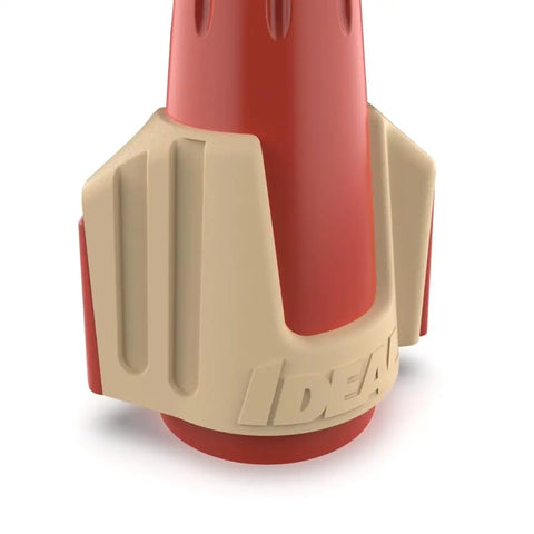 Close-up of Twister Pro Wire Connectors with SureGrip overmold and wing design for easy no-slip grip. Red color. Ideal logo view.