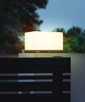 Chill Out In Style With These Modern Warm Led Post Cap Lights That Deliver Luxury Waterproof Vibes Perfect For All Your Fence Deck Garden And Patio Posts E26 Bulb Ready For Awesome Outdoor Living on a fence post at dusk.