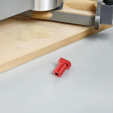 Close-up of red aluminum part from Six Piece Aluminum Workbench Dog Clamps With Low Profile Design For Desktop Tenon In Woodworking.