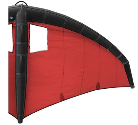 Red inflatable surf wing for wind foil and kitesurfing, handheld foil wing kite, side view, polyester with TPU film