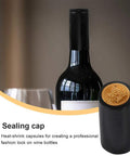 Solid As A Rock Heat Shrink Wine Caps, 150 Pack Black Bottle Sleeves For Home Cellar Projects showing professional sealing cap on a wine bottle.