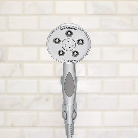 Premium Handheld Shower Head With AnyStream 360° Technology mounted on white tile wall